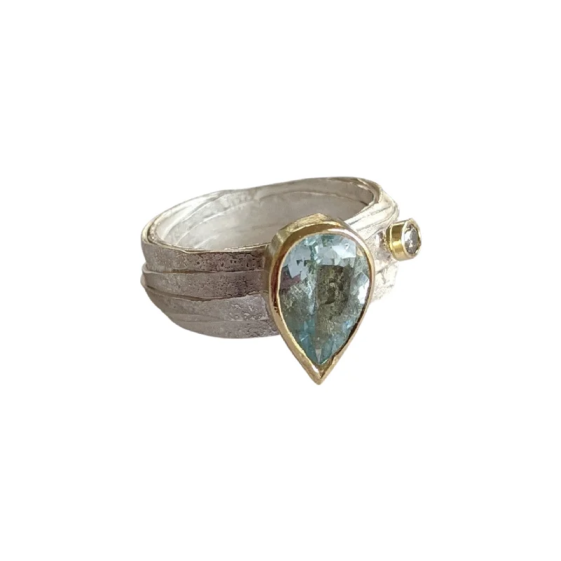 Gold and Silver Wrap Ring with Round Diamond and Pear Shape Moss Aquamarine